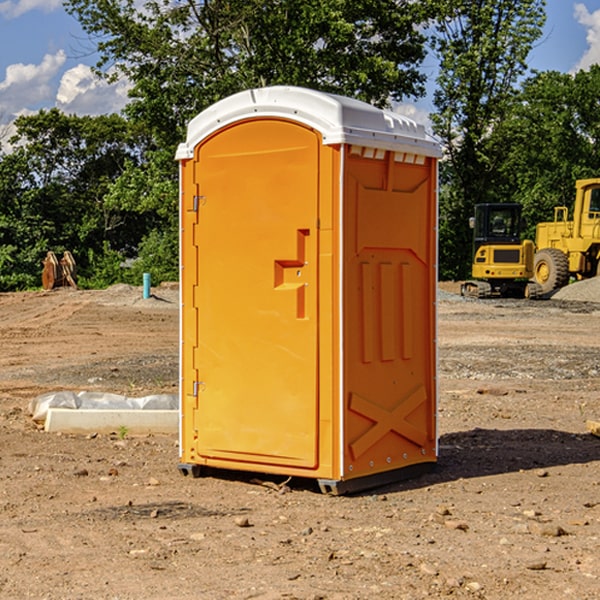 how often are the portable restrooms cleaned and serviced during a rental period in Kincheloe